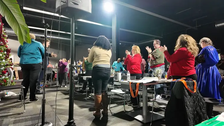 Holiday party standing ovation
